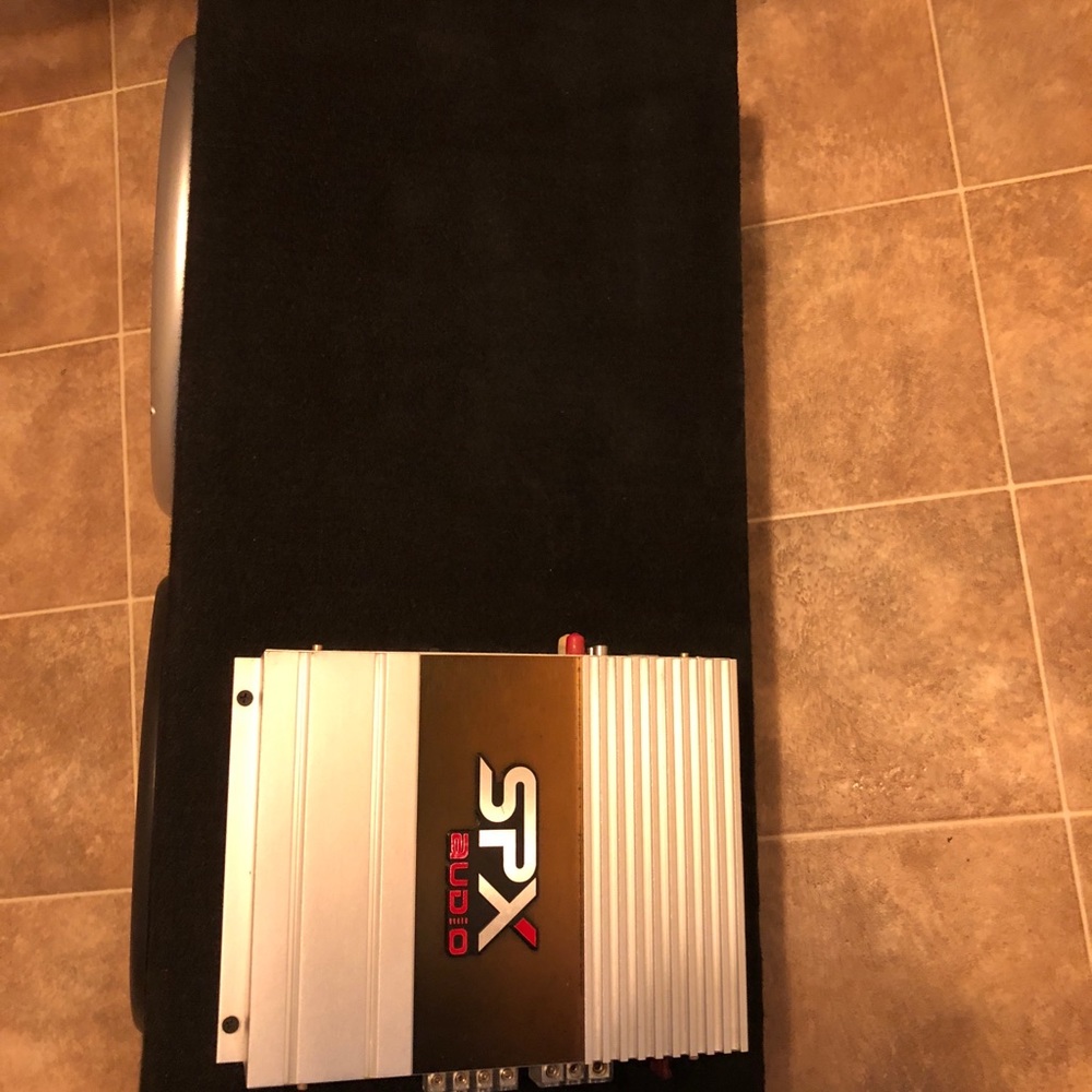 2 12in SPX subwoofers in box with amp. Good cond